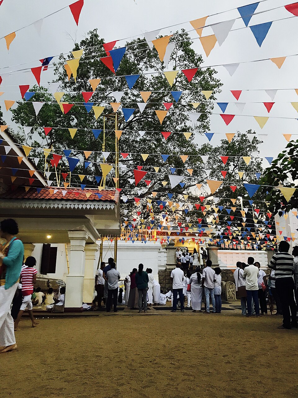 Buddhist flags and the Jaya Sri Maha Bodhi precinct in Anuradhapura, Sri Lanka